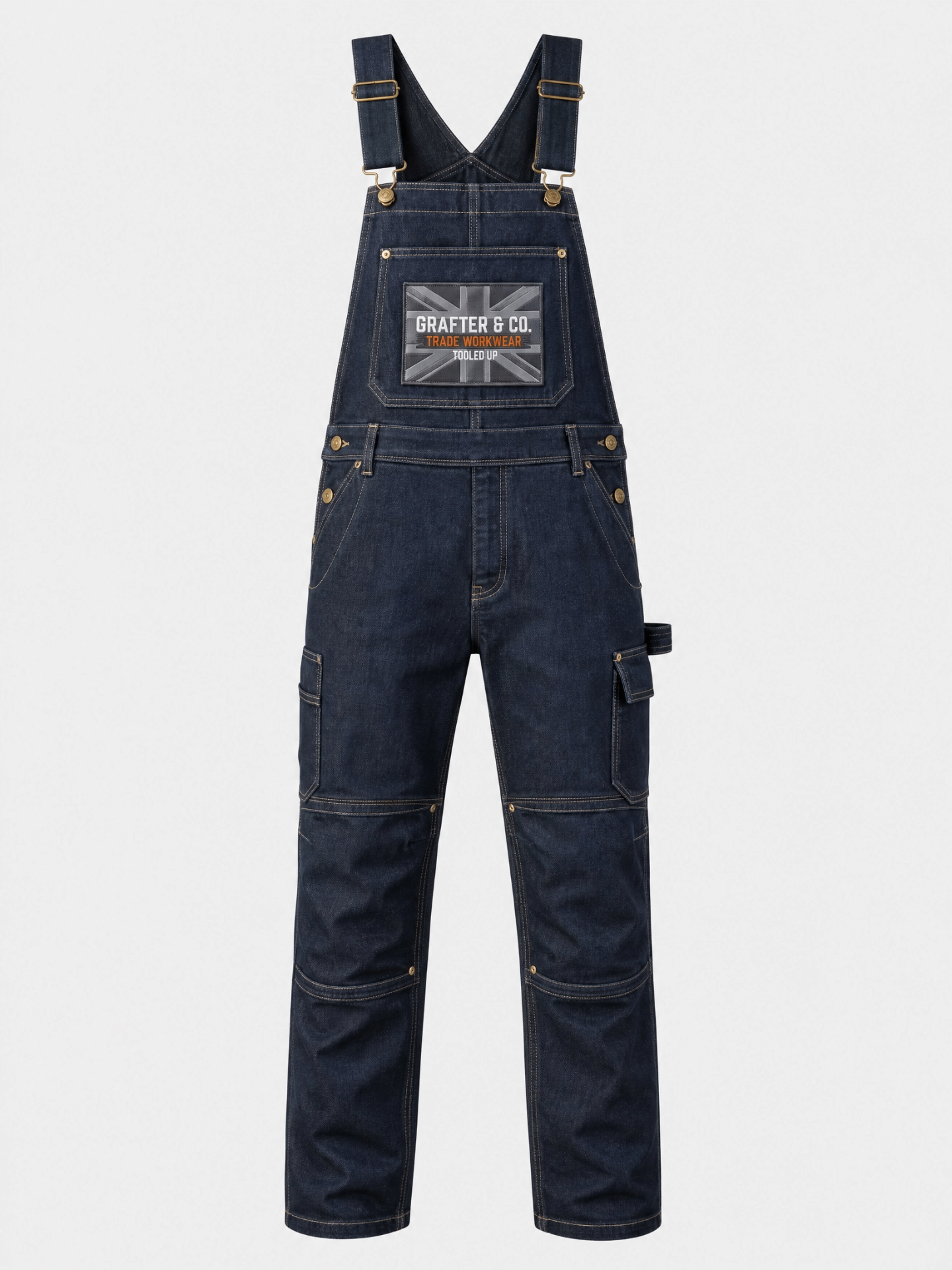 Grafter & Co. dark denim bib overalls with union jack chest patch and reinforced knees on a plain background