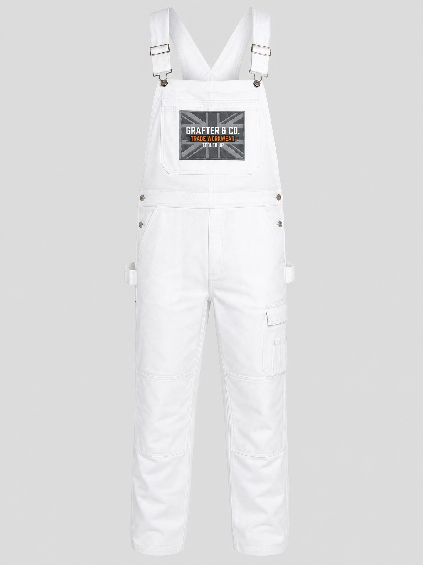 Grafter & Co. white painter's bib overalls with chest patch on a plain background