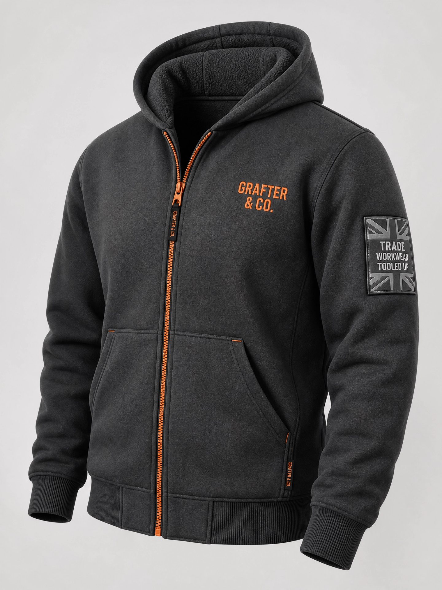 Grafter & Co. charcoal thermal hoodie with orange zip and sleeve patch on a plain background